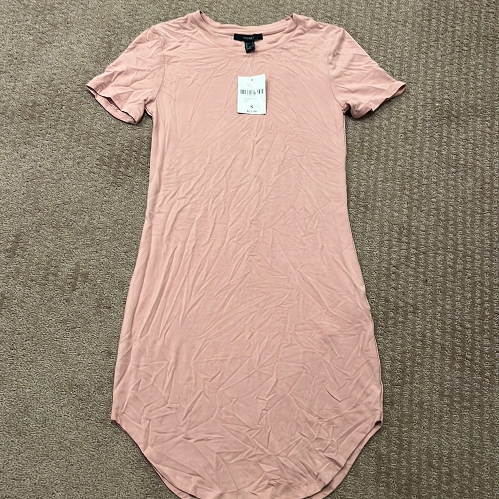 a light pink semi tight fit t-shirt style dress!
